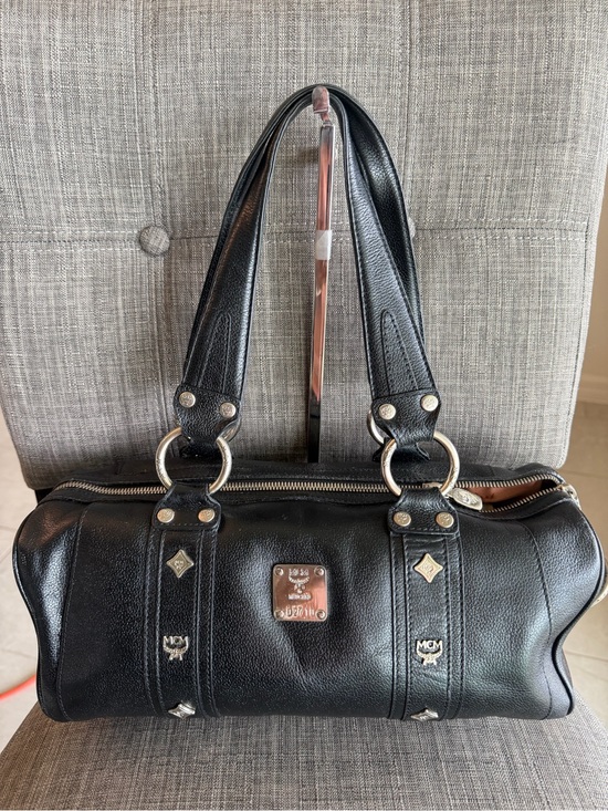 MCM Handbags - MCM Black Leather Barrel Shoulder Bag with Silver Accents